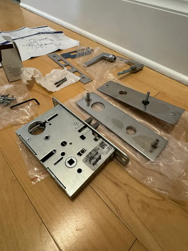 High-security ASSA mortise lock disassembled for rekeying
